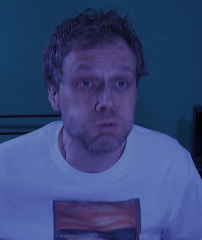 Kevin Meredith waking up from his computer nightmare in the first wepisode of his new webseries 