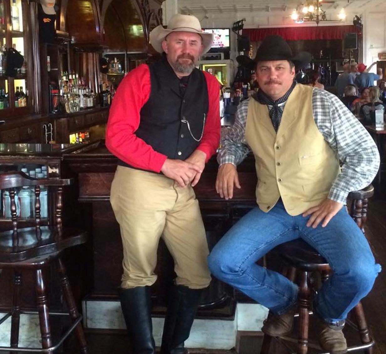 Glynn Praesel, producer and host of Cowboys and Heroes, with Shawn Dunham, horse wrangler.