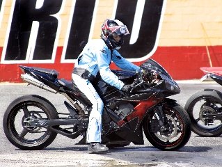 Crystal pictured with her yamaha R1 drag motorcycle.