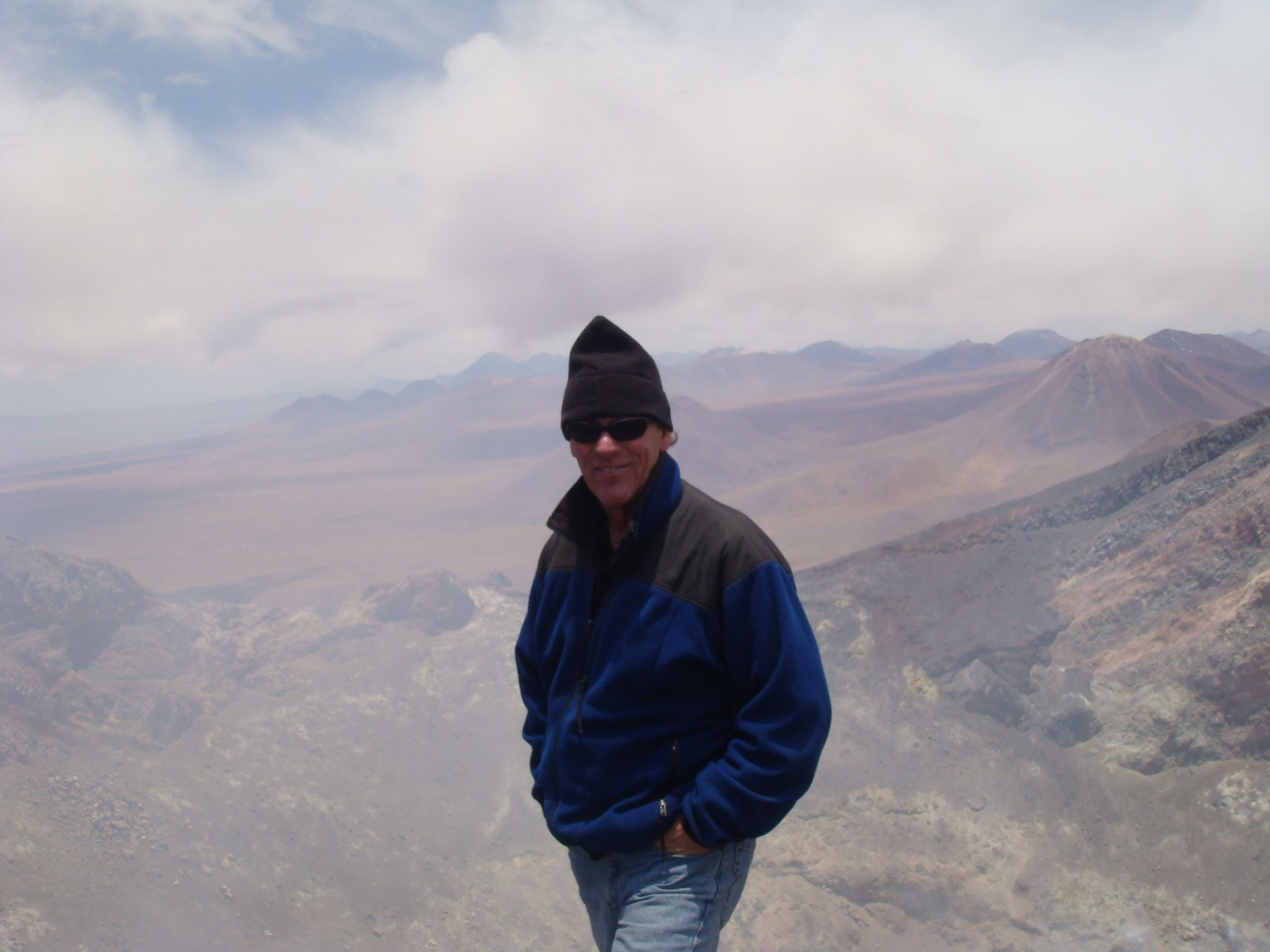Randall atop a volcano peak in the Atacama Desert,Chile.
