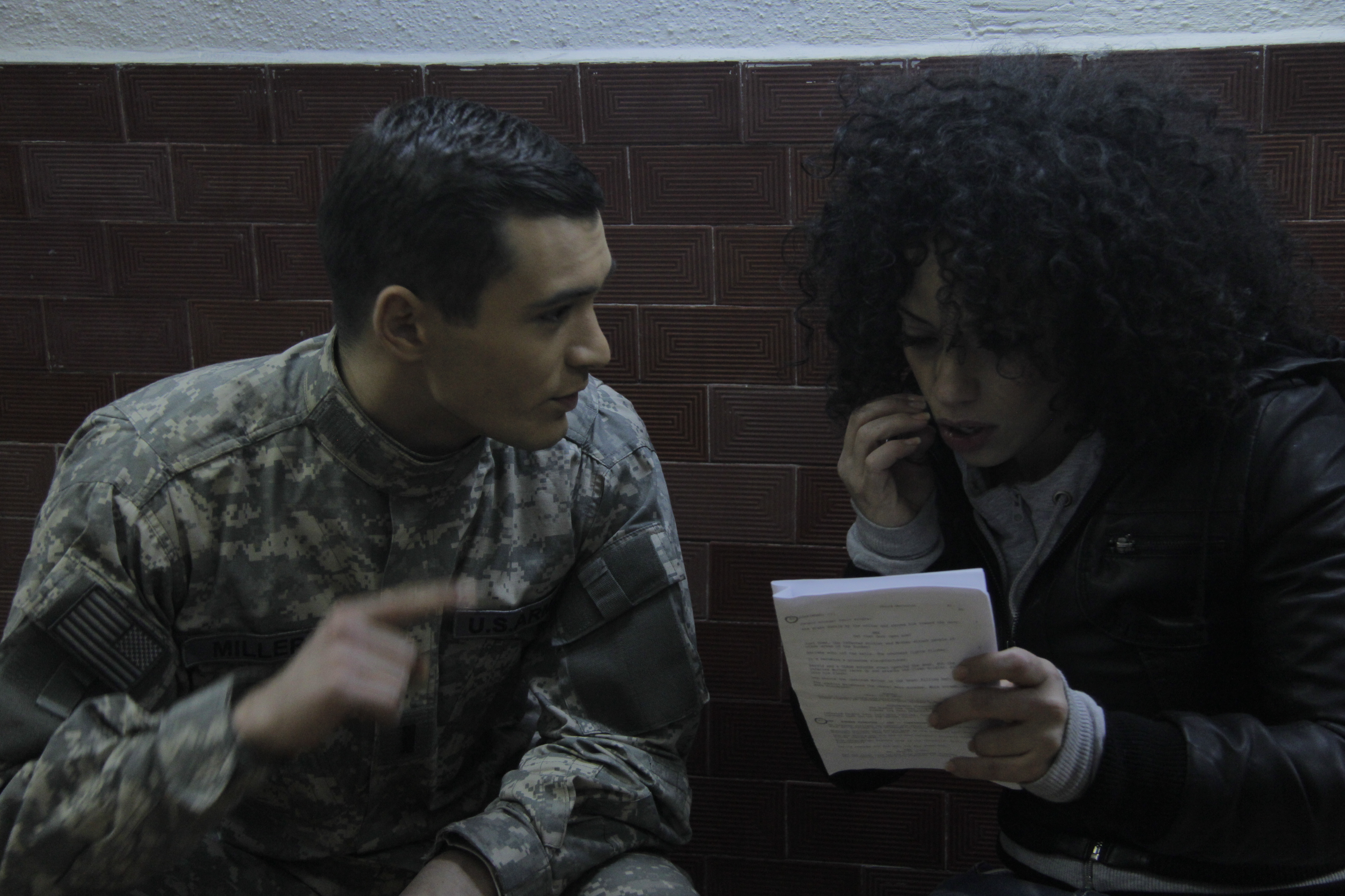 Still of Manal El-Feitury and Julian Kostov in Code Red