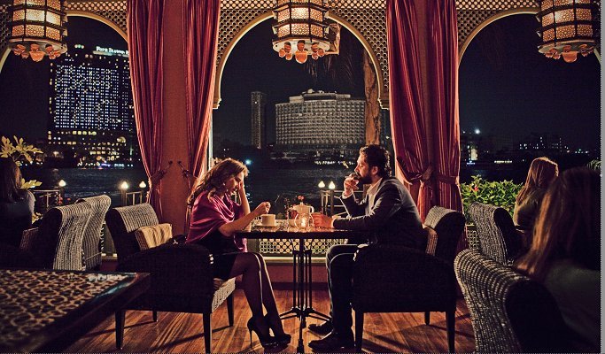 Still of Nelly Karim and Karim Abdel Aziz in The Blue Elephant (2014)