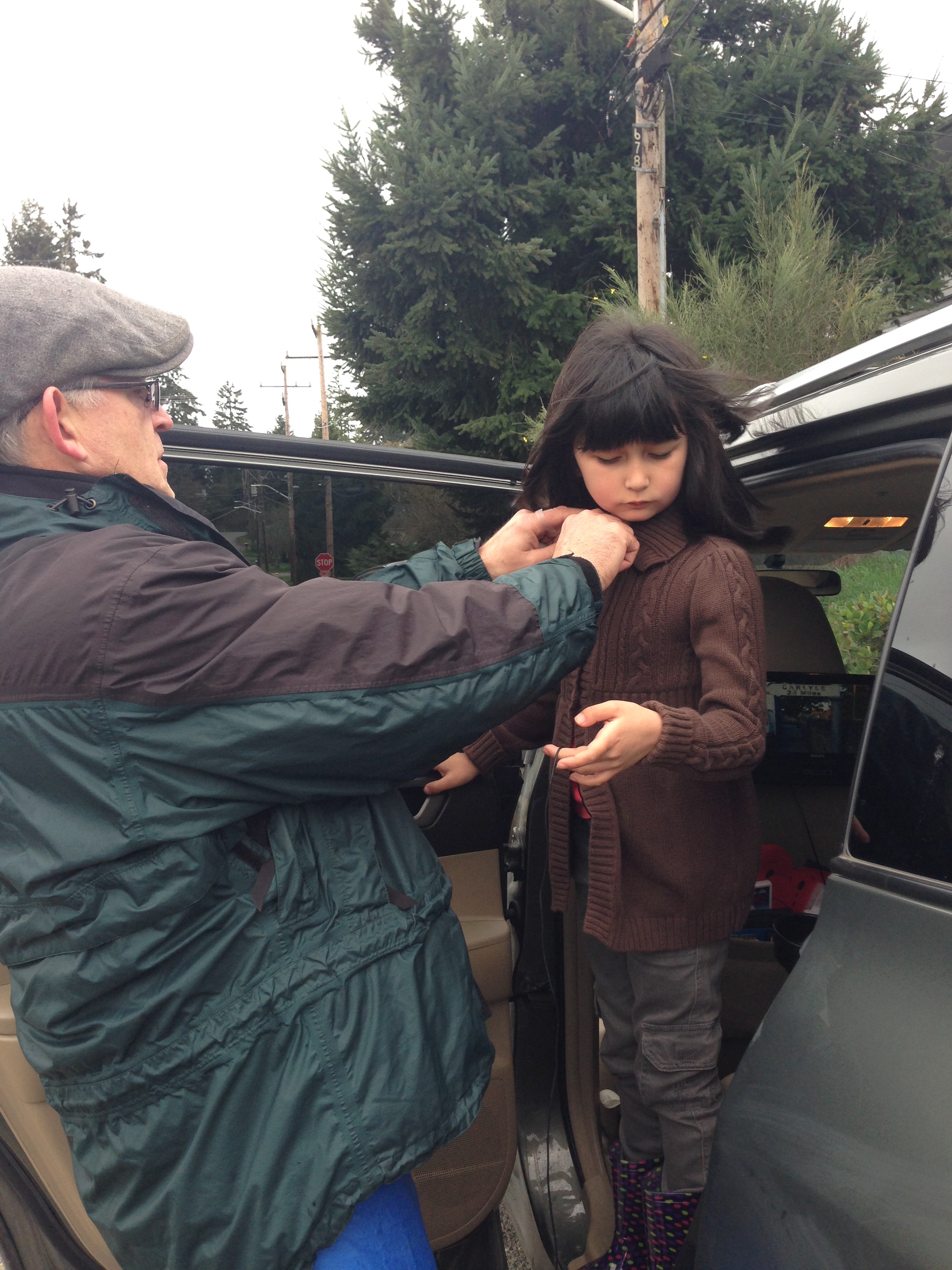 Working on a short film that will be shown at the Seattle International Film Festival, 2014. Having her mic placed.