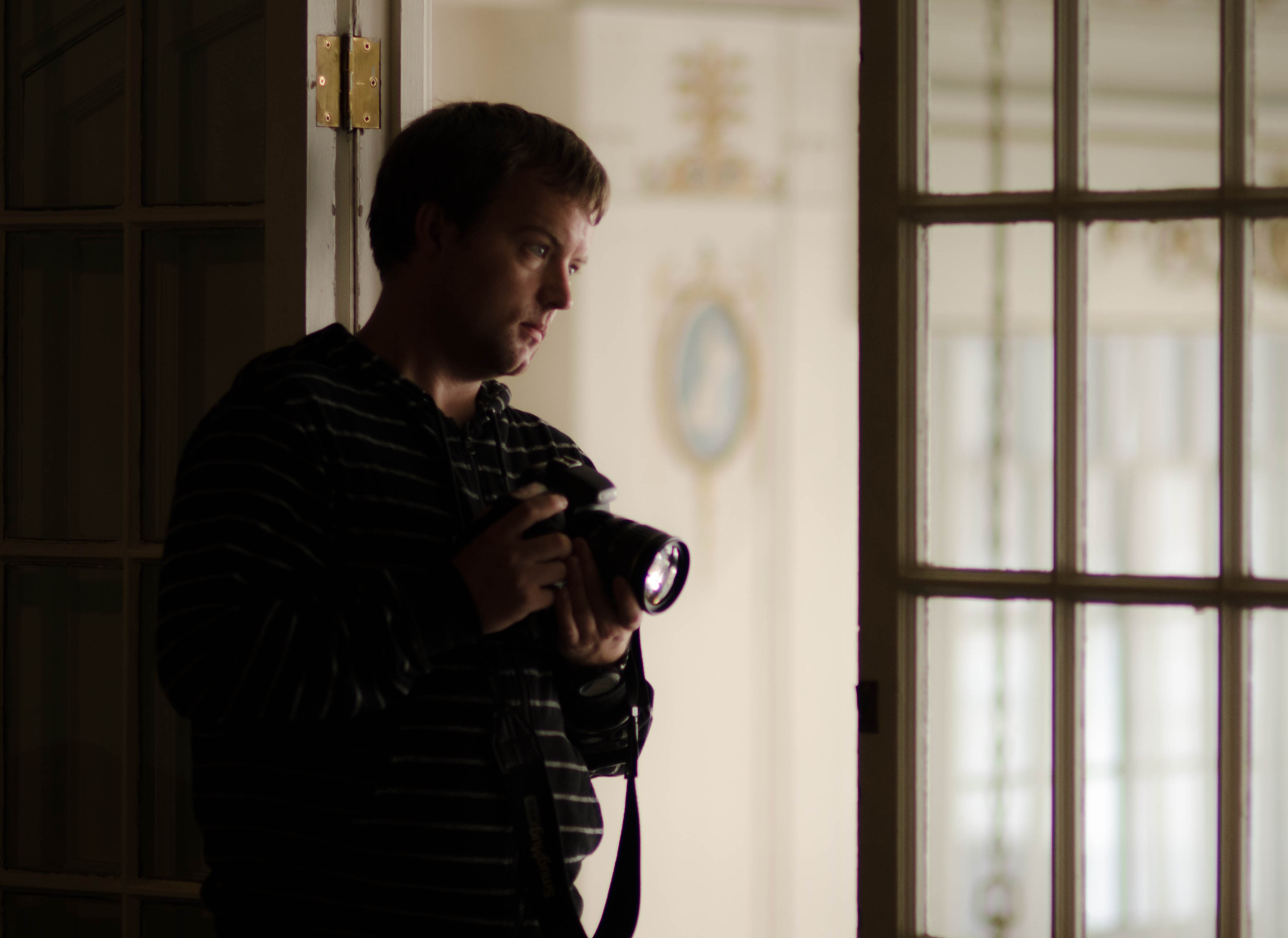 Jamie shooting still photos on the set of the Umbrella Man Movie