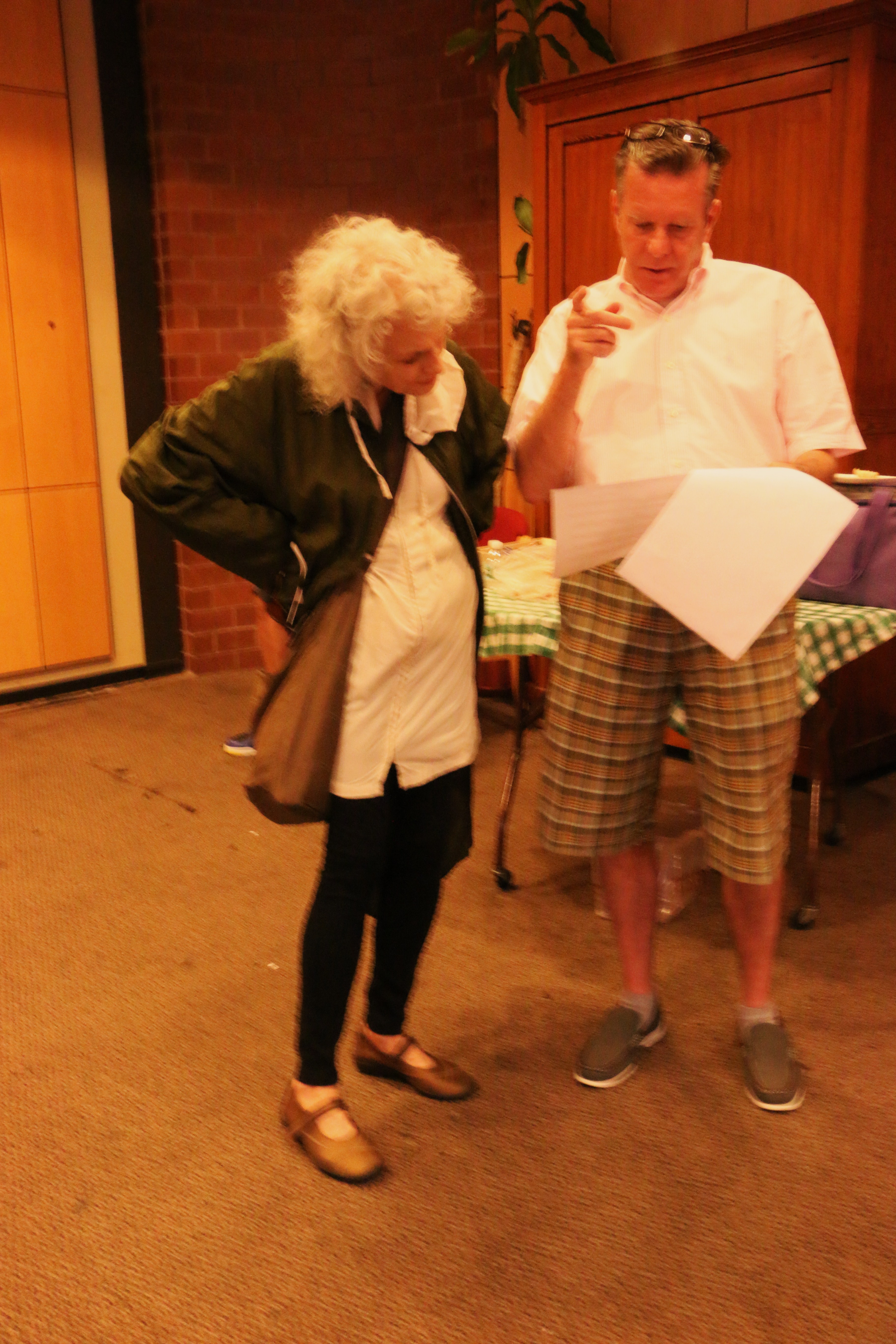 Judith Roberts and Paul Kelly going over the next scene in 