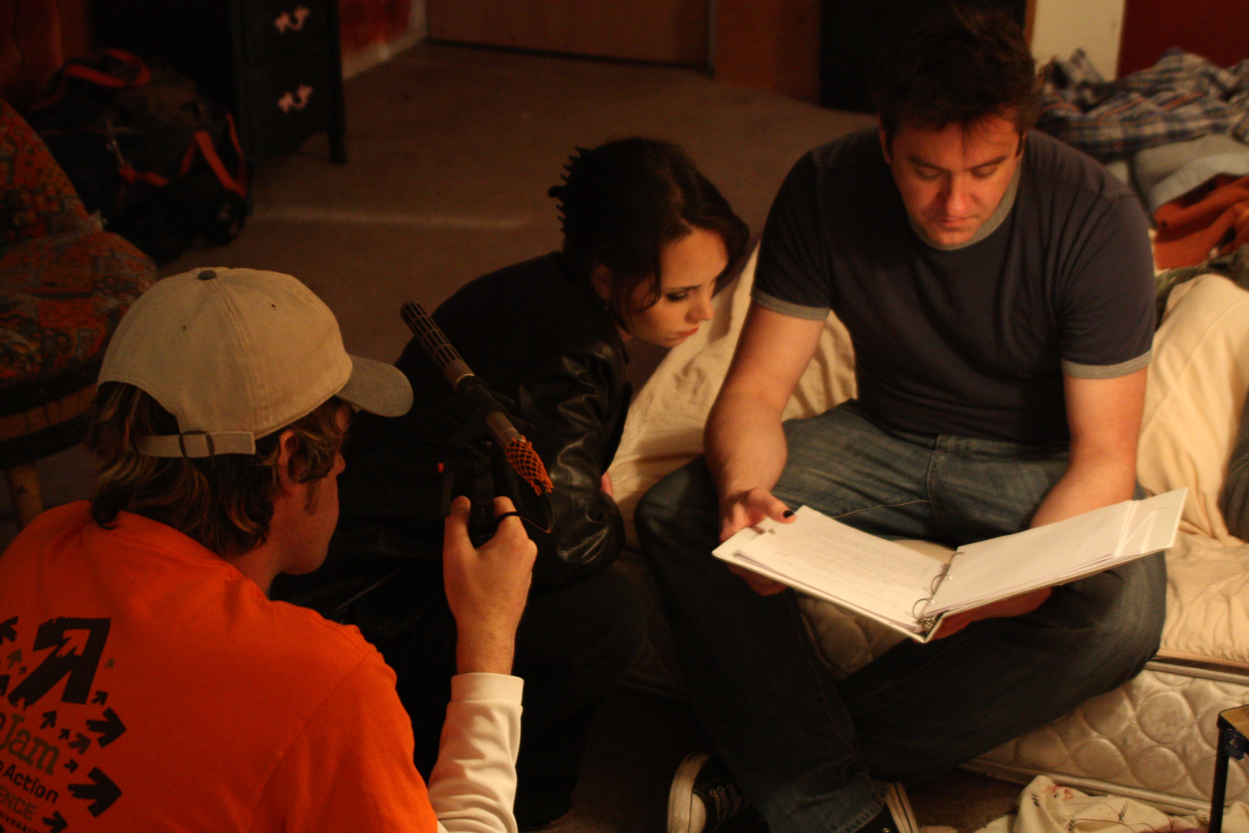 Director Brian McCulley talks with actress Jen Summers on the set of 