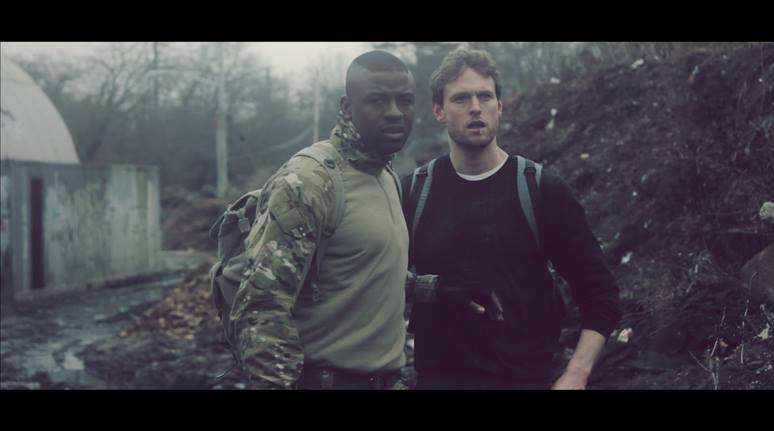 Still of Mo Diaby and Actor Michael Patrick Lane in The Last of Us.