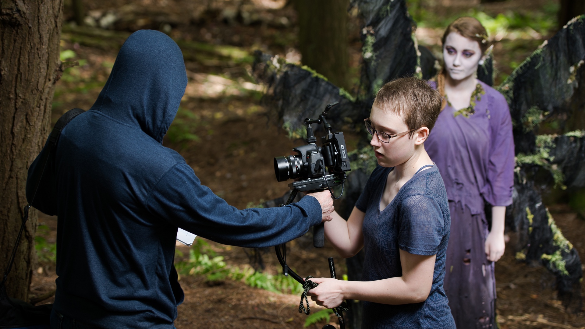 Morgana Mckenzie preparing to use her Blackbird stabilizer, shooting a scene for her music video 