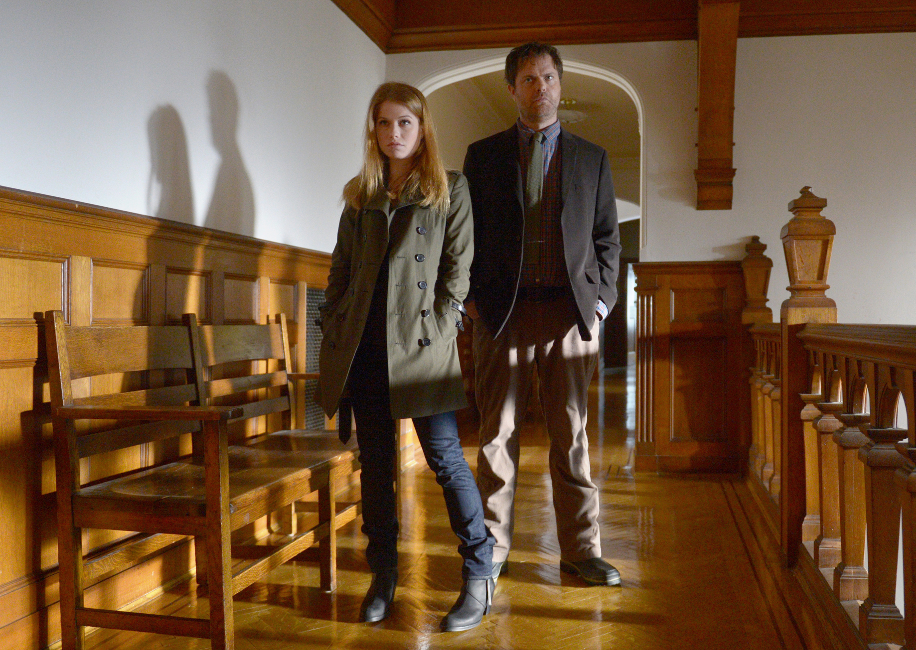 Still of Rainn Wilson and Genevieve Angelson in Backstrom (2015)