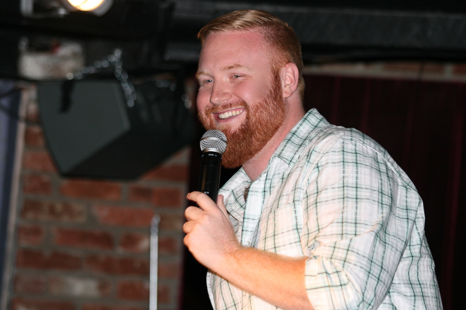 Josh performing stand-up comedy in Orange County, CA.