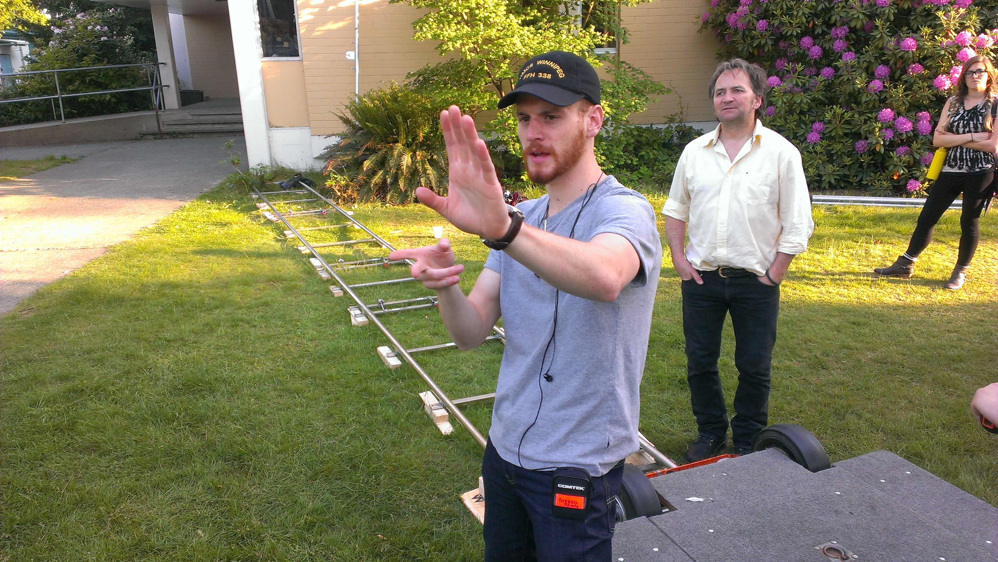 Nigel Edwards lining up a shot with Cinematographer Danny Nowak