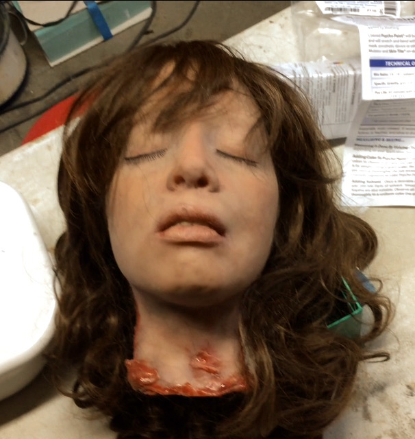 Karens severed head