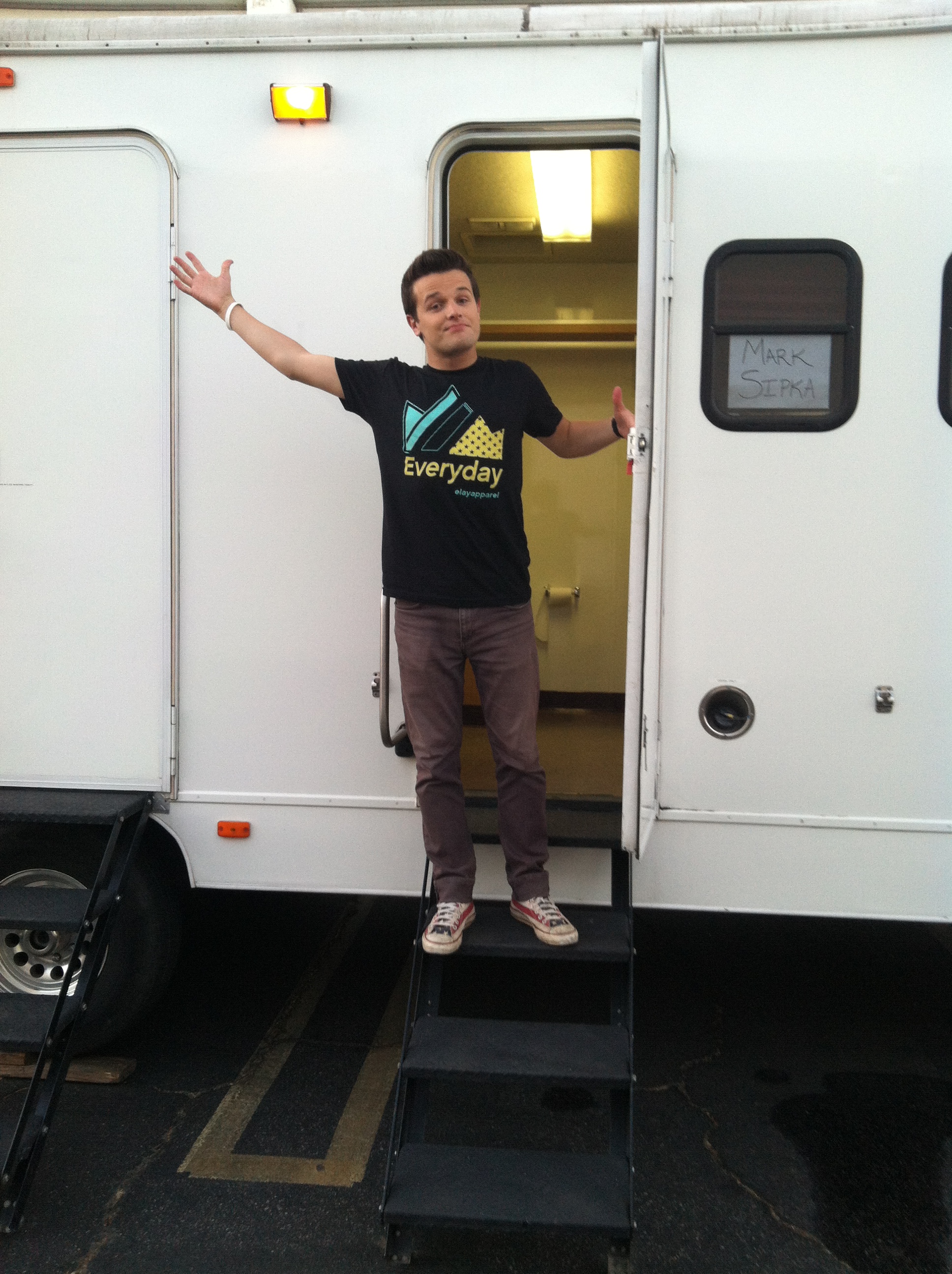 Mark Sipka outside of trailer for Spark It Up Live event.