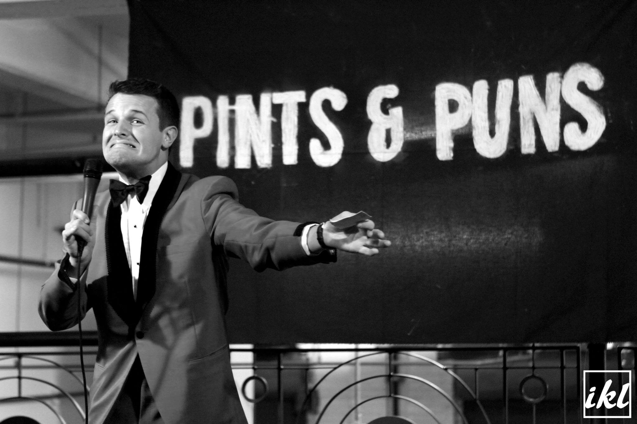 Mark Sipka performing at Pints & Puns Anniversary show.