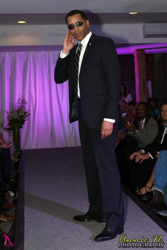 Actor Lamont Easter on the Fashion Runway for charity modeling the latest in Secret Service Fashion