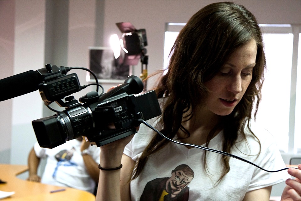 Celinka Serre with her camcorder, Bianca, on the set of 'Compiling.tv' Season 1.