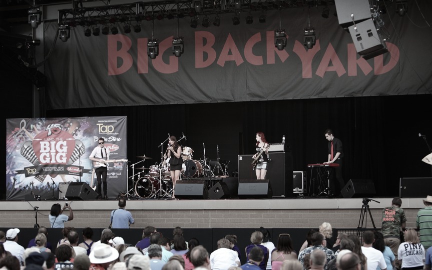 Still of Flavia Watson performing on one of the main stages at Summerfest, WI.