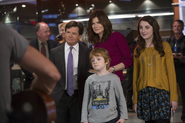 Still of Michael J. Fox, Betsy Brandt, Juliette Goglia and Jack Gore in The Michael J. Fox Show (2013)