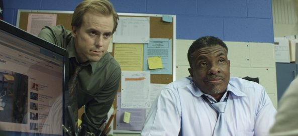 Patrick O'Sullivan as Detective Cooper (with Keith David) in the horror film 