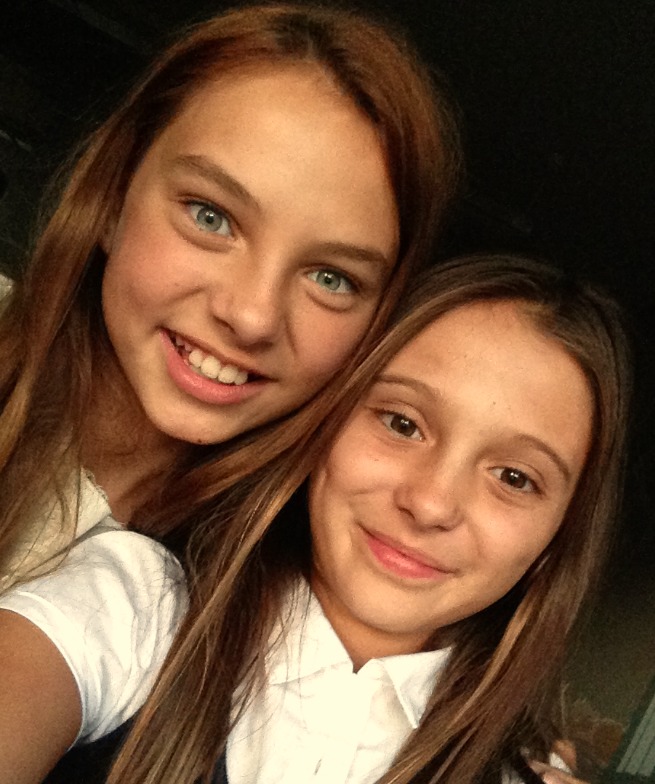 Caitlin Carmichael and Elyse Cole on the set of 