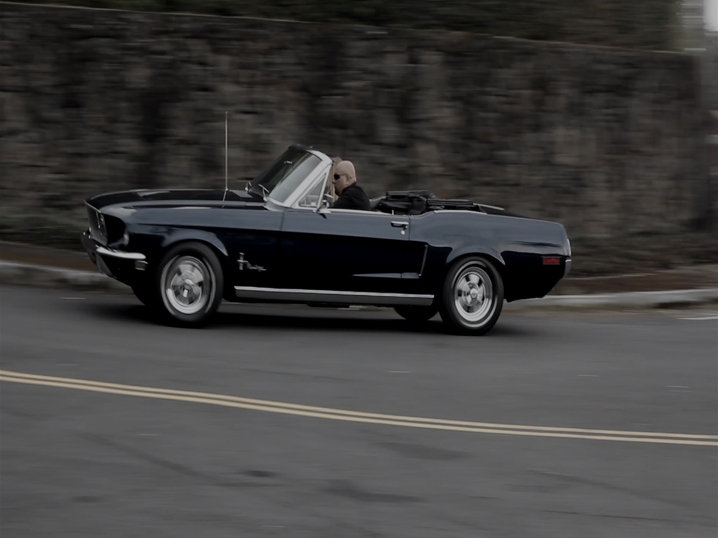 Bullitt (Richard Gonzalez) on his way to the Cemetery with Lani (Mary Croix) in the 68 Mustang