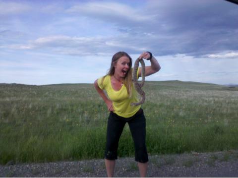 Wild Woman Kellie Nightlinger with a Rattlesnake. She is afraid of nothing