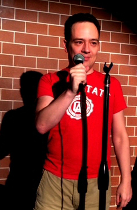 Luijten performing at the Ha Ha Cafe Comedy Club in North Hollywood.