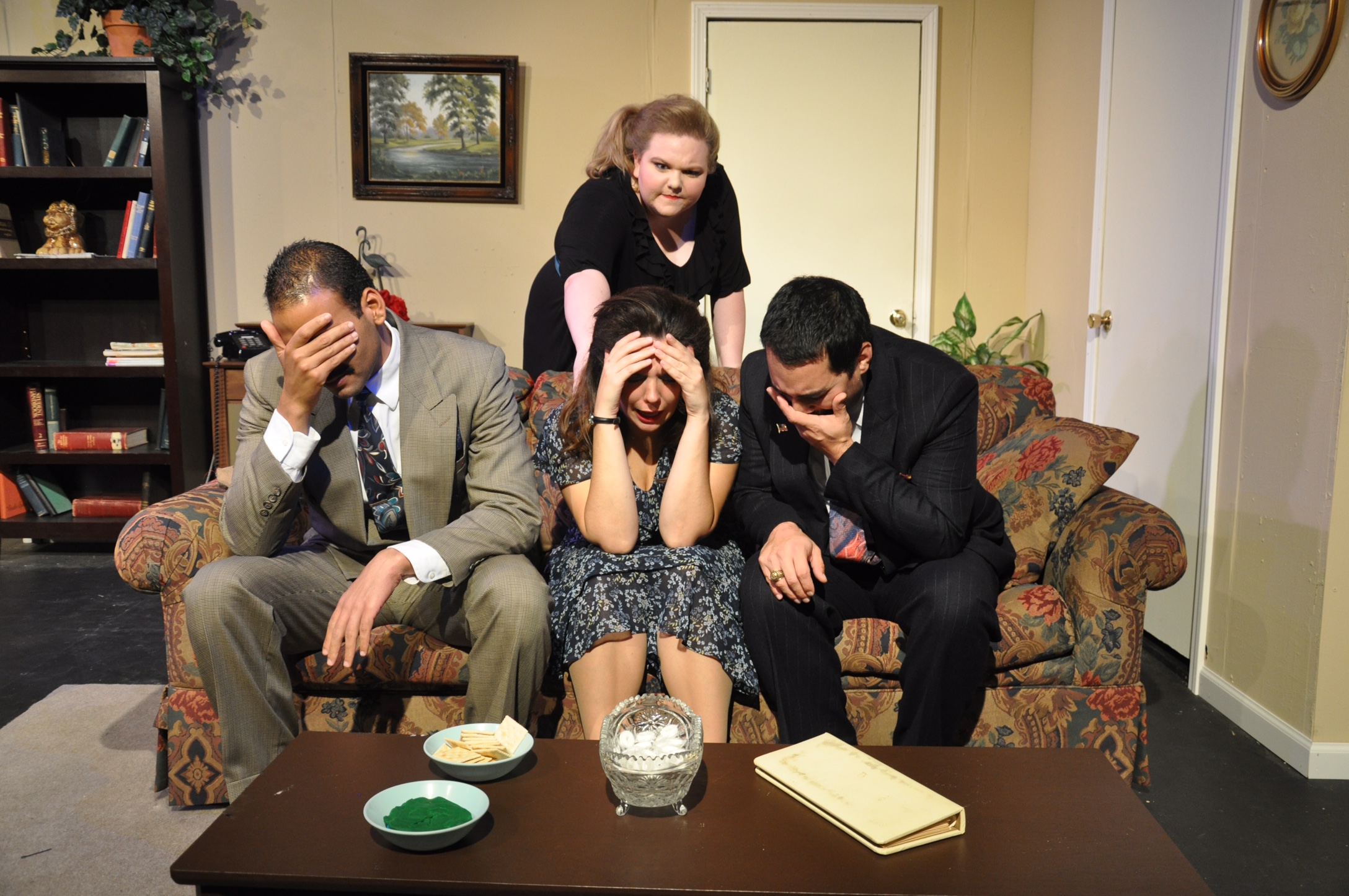 Teddy Alexis Rodriguez, Miranda Stubbles, Sarah Nobles and Randal Ramirez on stage during a performance of The Odd Couple, Female Version at the Lubbock Community Theatre in Lubbock, Texas. 2014.