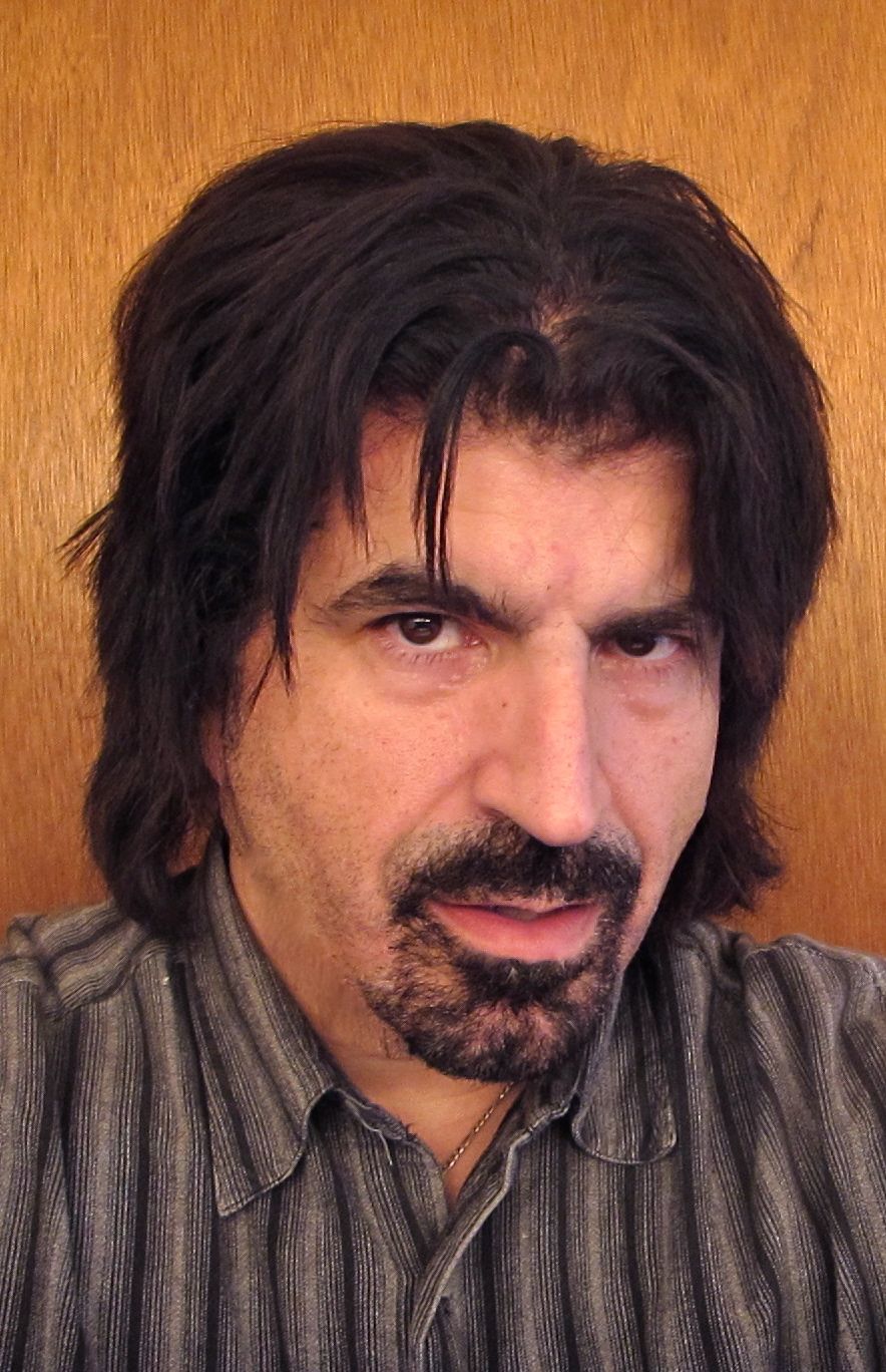 Myself with goatee and medium length hair. The Pacino look. ;)