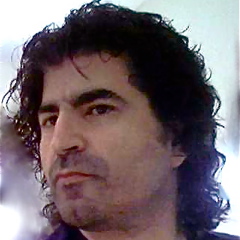 Here I am w/ loose curly hair style-to shoulders.