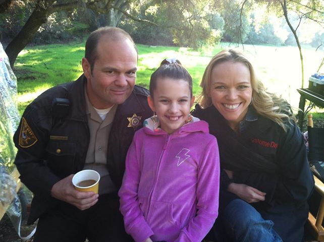 Chloe on the set of True Blood with her Dad on the show Chris Bauer and Lauren Bowles
