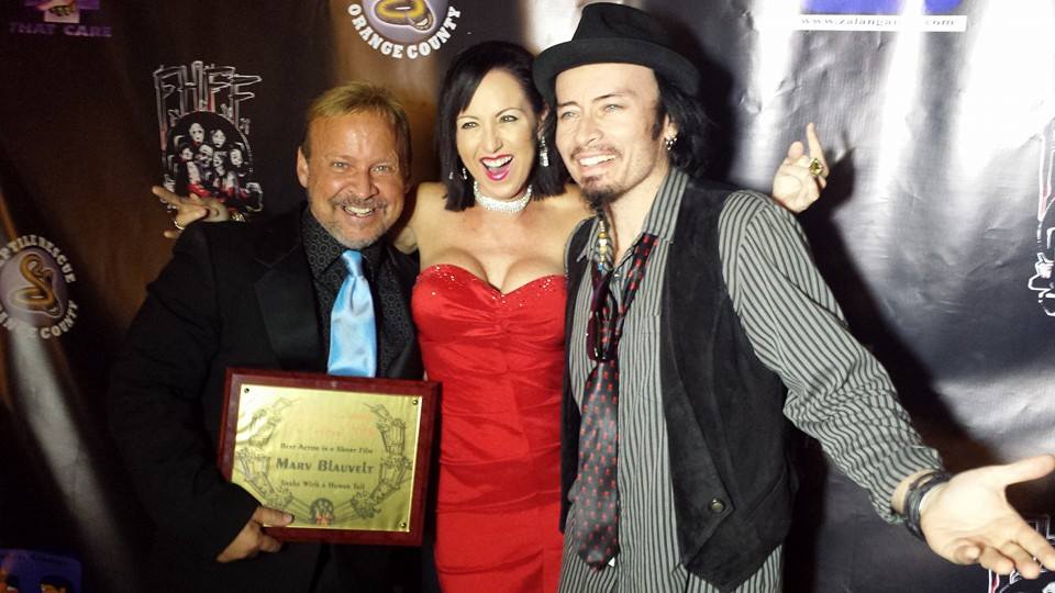 Actor Marv Blauvelt, Actress/Producer Sheri Davis, and Actor/Musician Billy Blair at the awards ceremony for their film by Spencer Gray, 