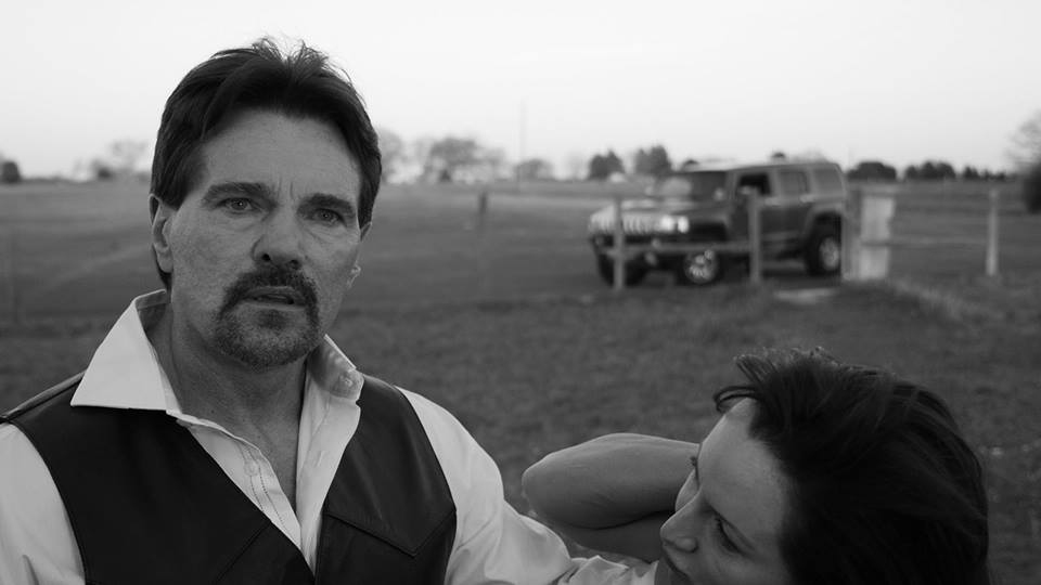 Actor Carl Bailey and Actress Sheri Davis screenshot of a very intense and emotional scene from 