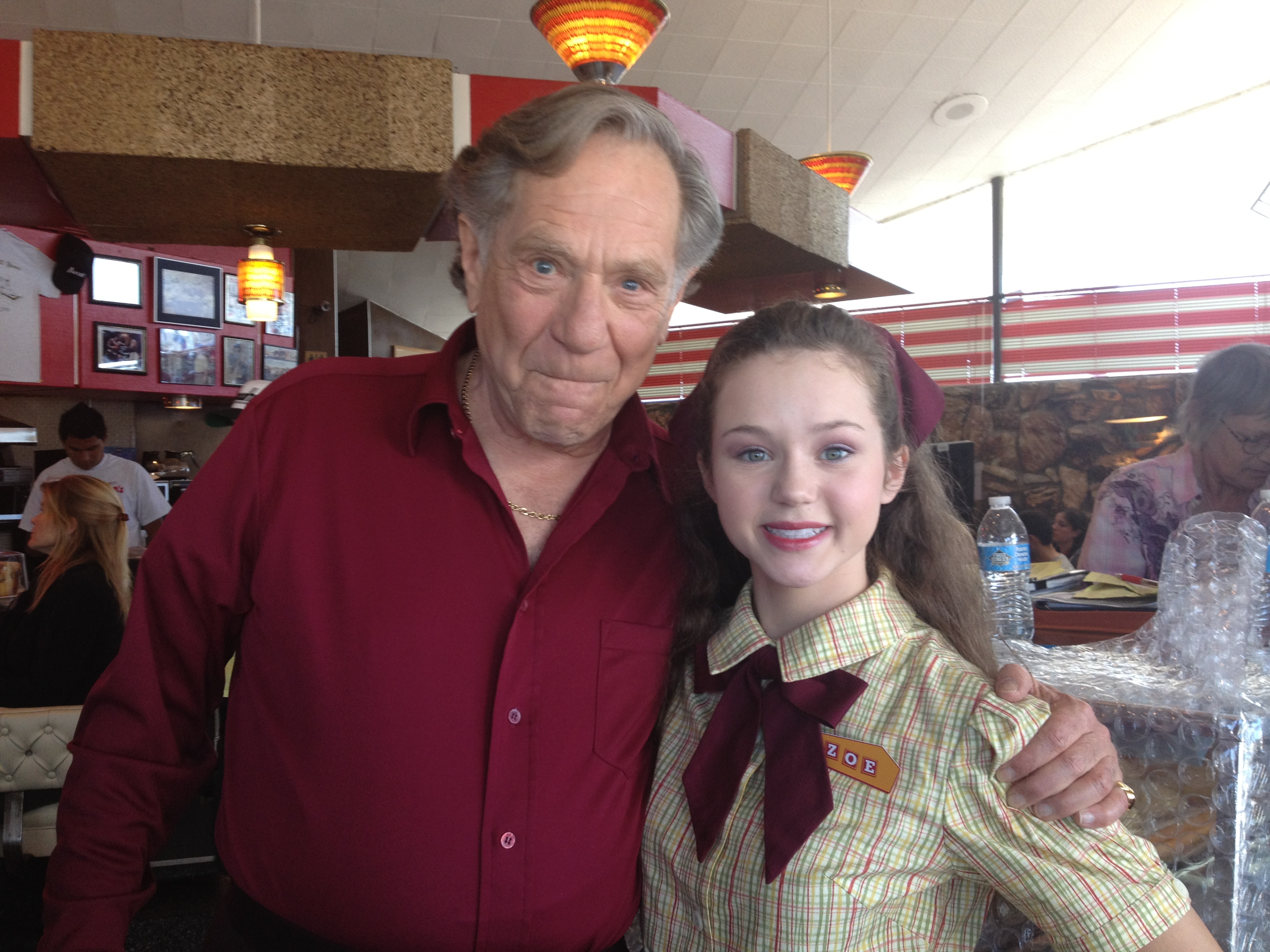 Brec Bassinger and George Segal on set of The Goldbergs