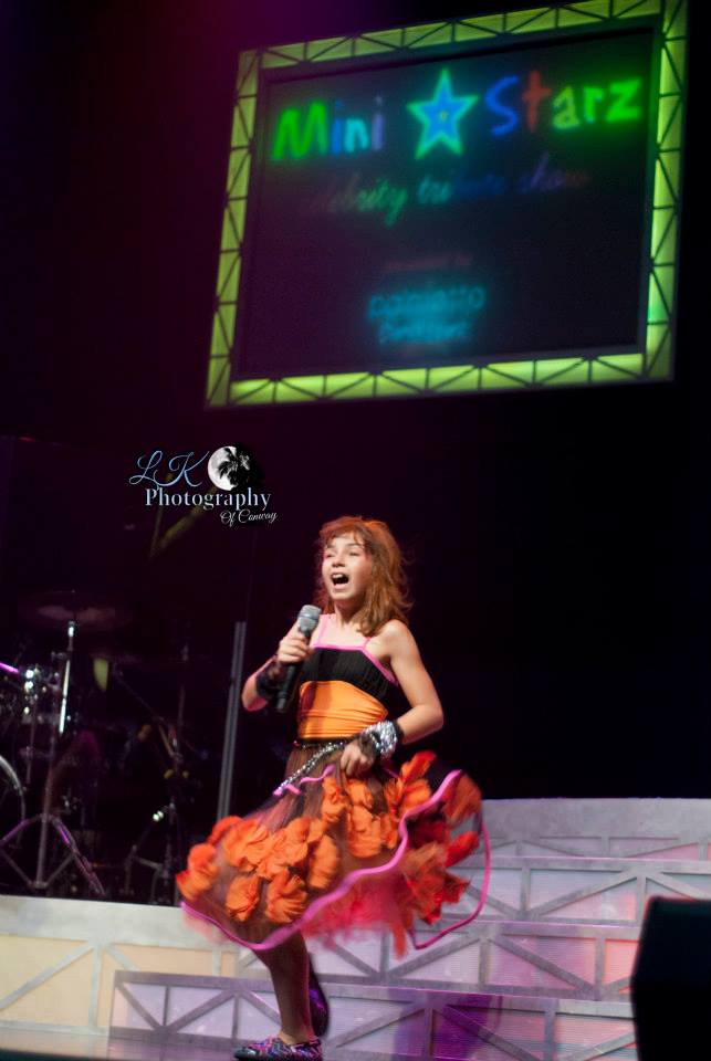 Sabrina as a mini Cyndi Lauper at Legends in Concert in Myrtle Beach, July 2014.