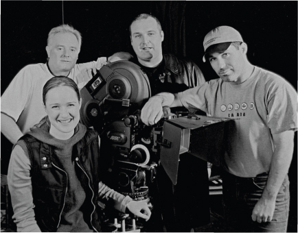 Emma Farrell, Bruce Jones (Cornonation Street), Frank Harper (Lock Stock & Two Smoking Barells) with director Lee Chambers on a 35mm commercial shoot.