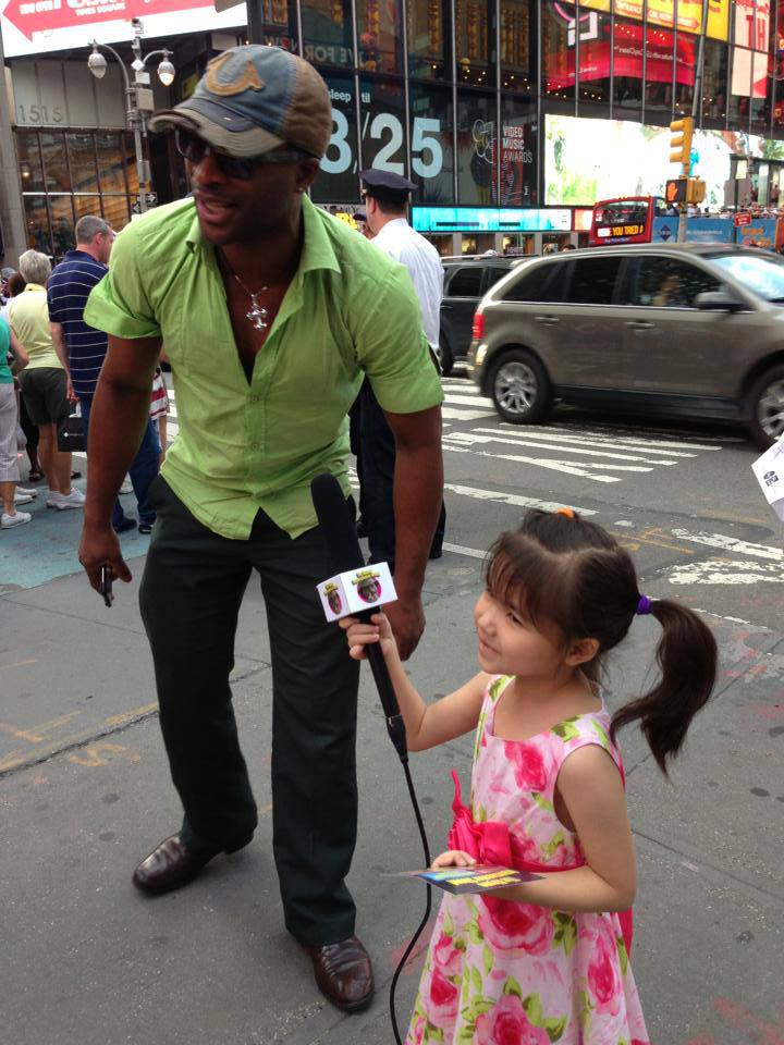 Executive Producer Richard Oliver Jr. LIVE in time square being interviewed by up and coming child star 