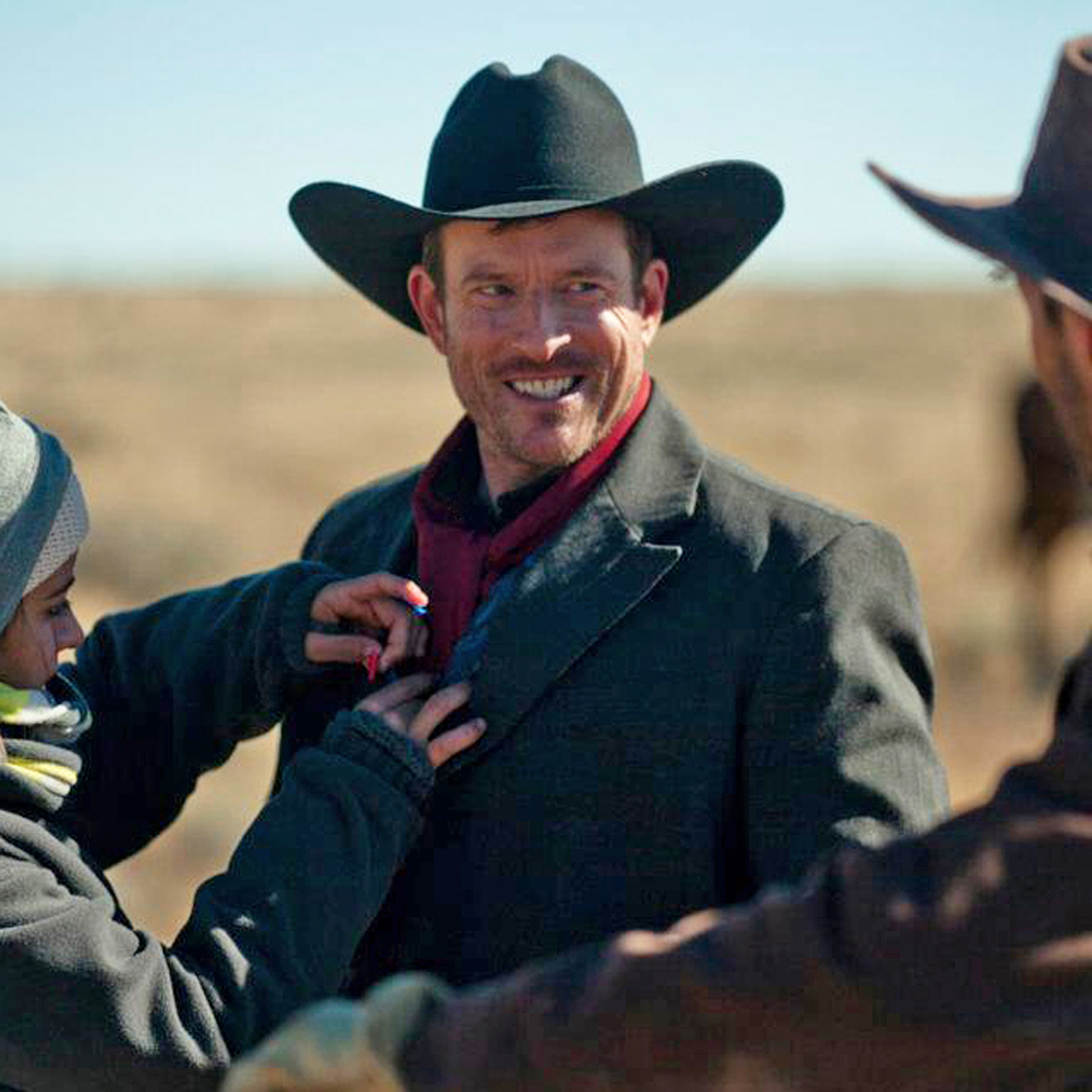 Chris Norden getting his wardrobe adjusted prior to a take on the set of the circa 1896 Western, 