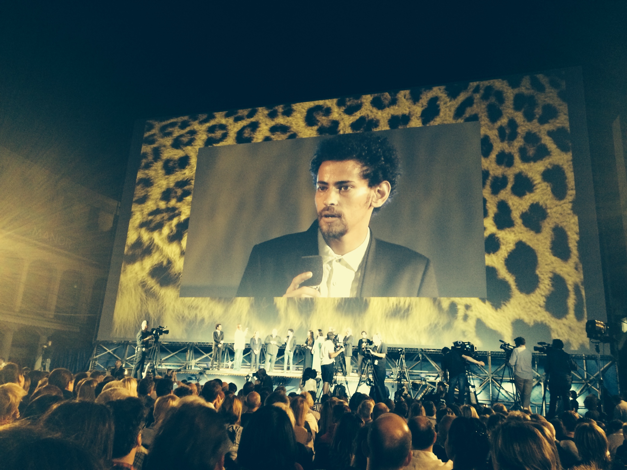 Tawfeek Barhom on Locarno's film festival stage at the grande piazza representing his new film DANCING ARABS by director Eran Riklis.