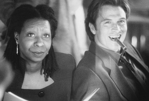Still of Whoopi Goldberg and Tim Daly in The Associate (1996)