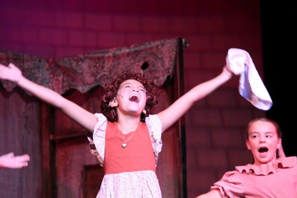 Bella Stine performing as Annie in the musical Annie Jr. at BMT Stars.