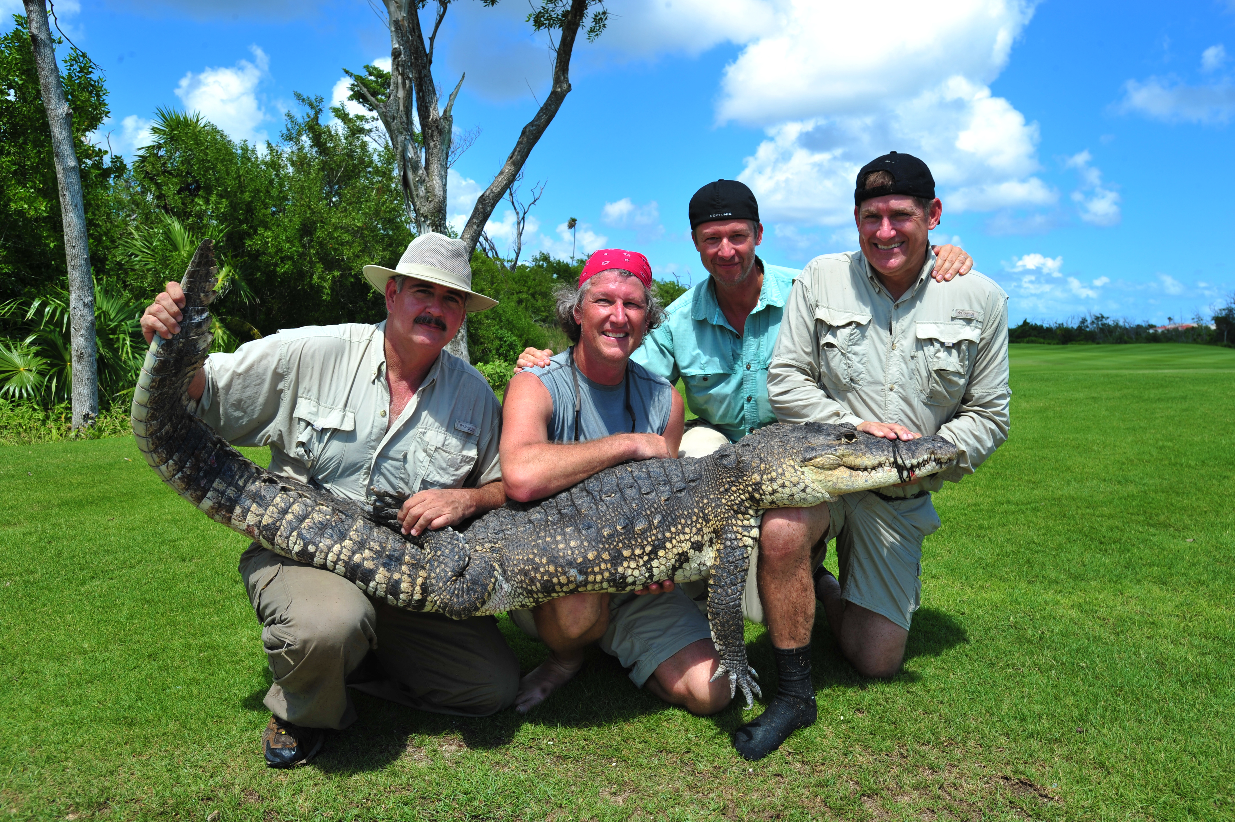Marco Lazcano-Barrero, R.C., Simon Boyce & Brady Barr w/gator on location in Cancun during the production of National Geographic's 