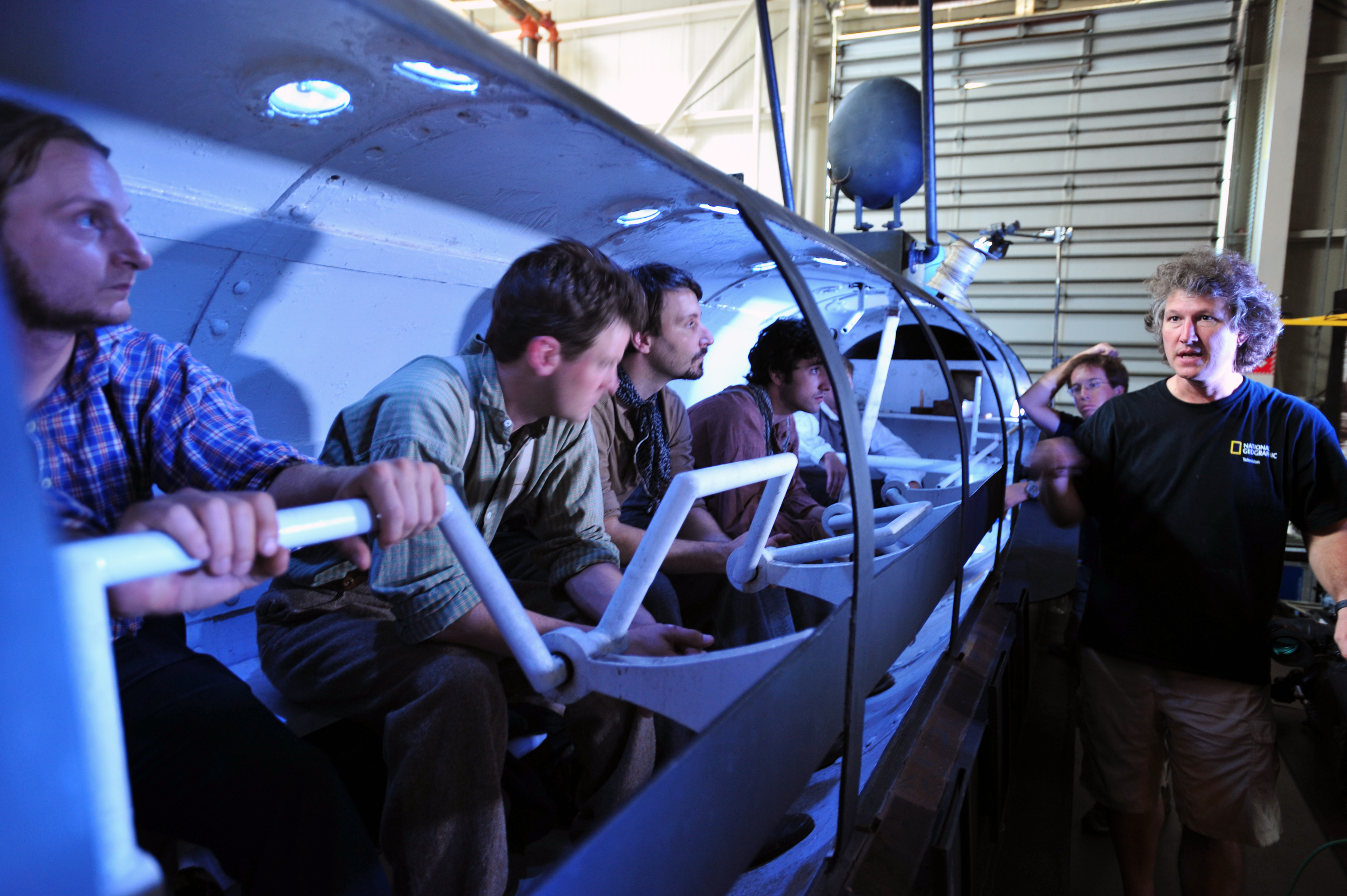 RC working with actors to recreate scenes inside a mock-up of the C.S.S. Hunley - the first submarine to engage and sink an enemy warship. The footage was part of the National Geographic TV Special, 'Secret Weapon of the Confederacy.