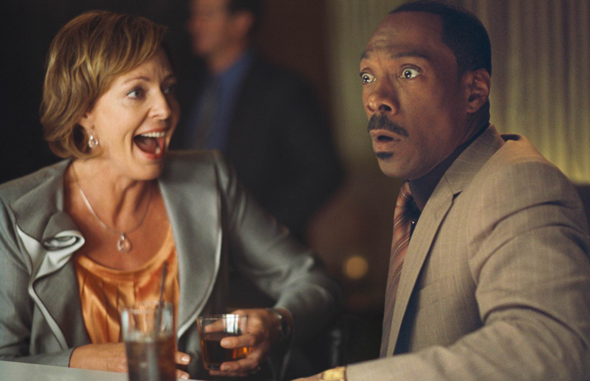 Still of Eddie Murphy and Allison Janney in Tukstantis zodziu (2012)