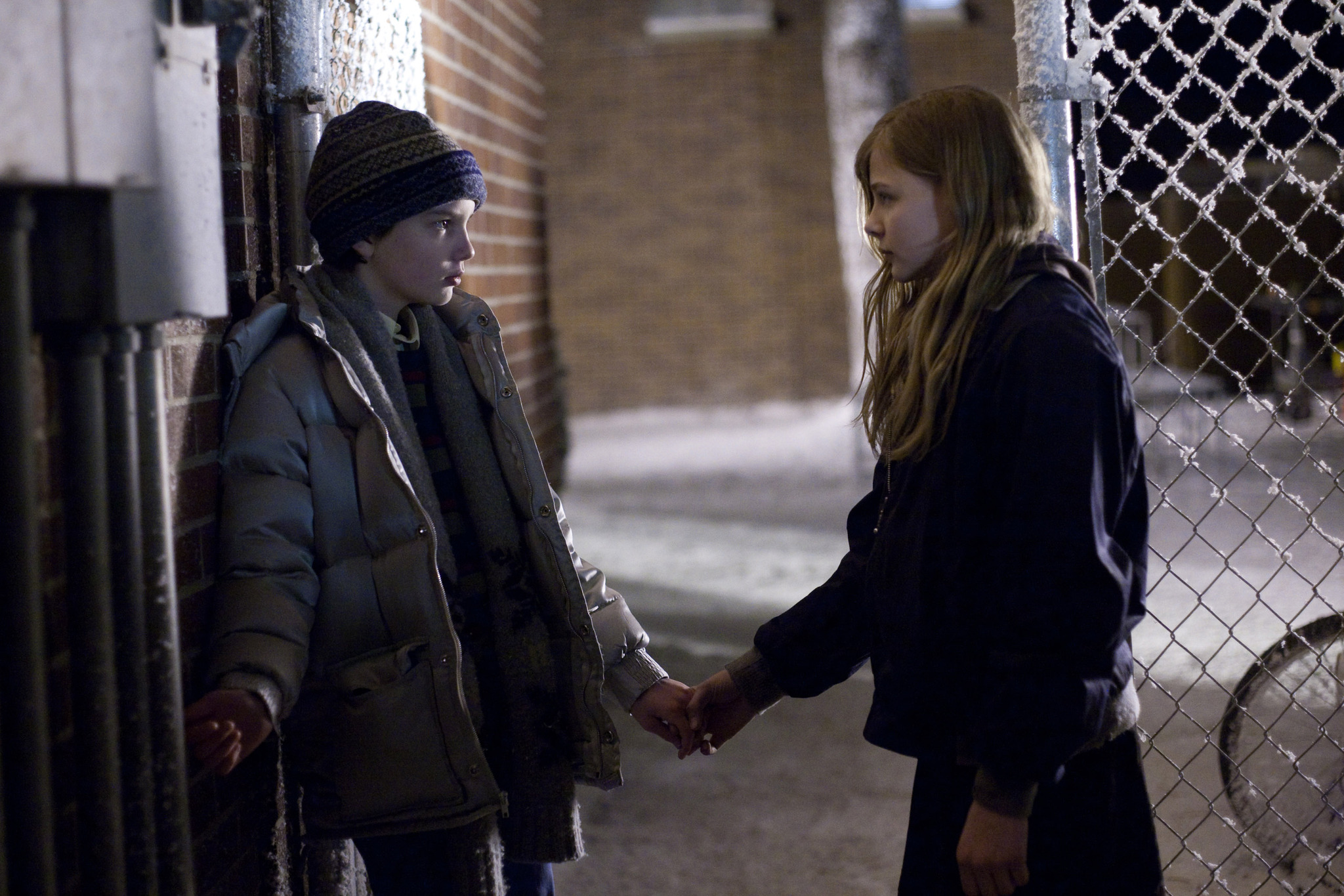 Still of Chloë Grace Moretz and Kodi Smit-McPhee in Let Me In (2010)