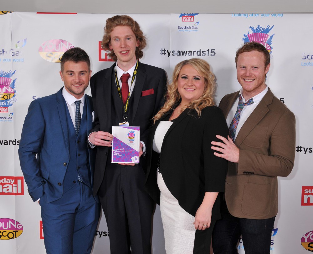 Mark Flood, collecting his Young Scot Award with the cast of River City