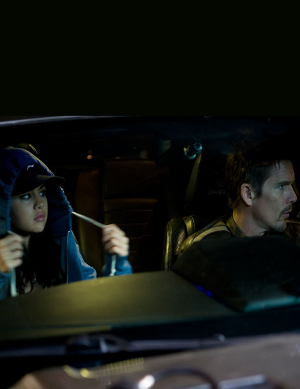 Still of Ethan Hawke and Selena Gomez in Getaway (2013)