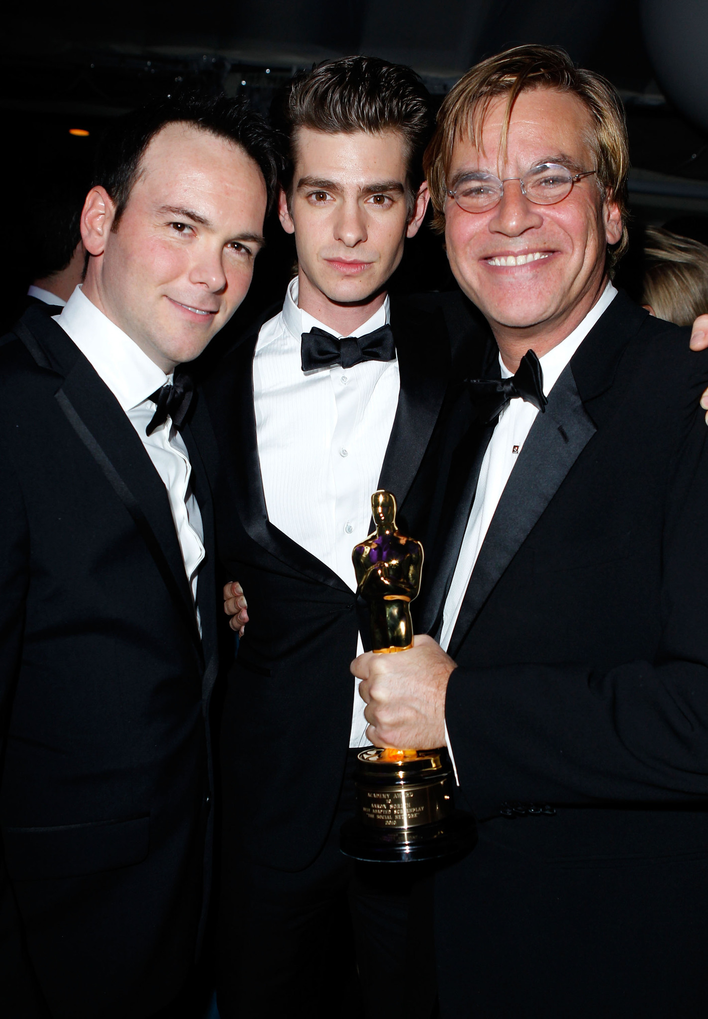 Dana Brunetti, Aaron Sorkin and Andrew Garfield