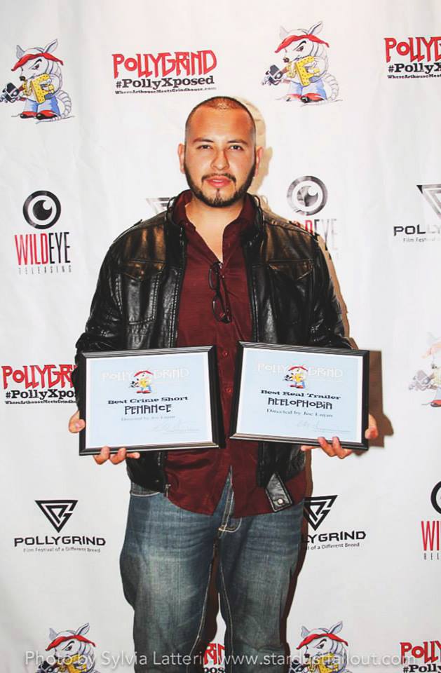 Joe Lujan at The Polly Grind Film Festival in Las Vegas with his Awards: 