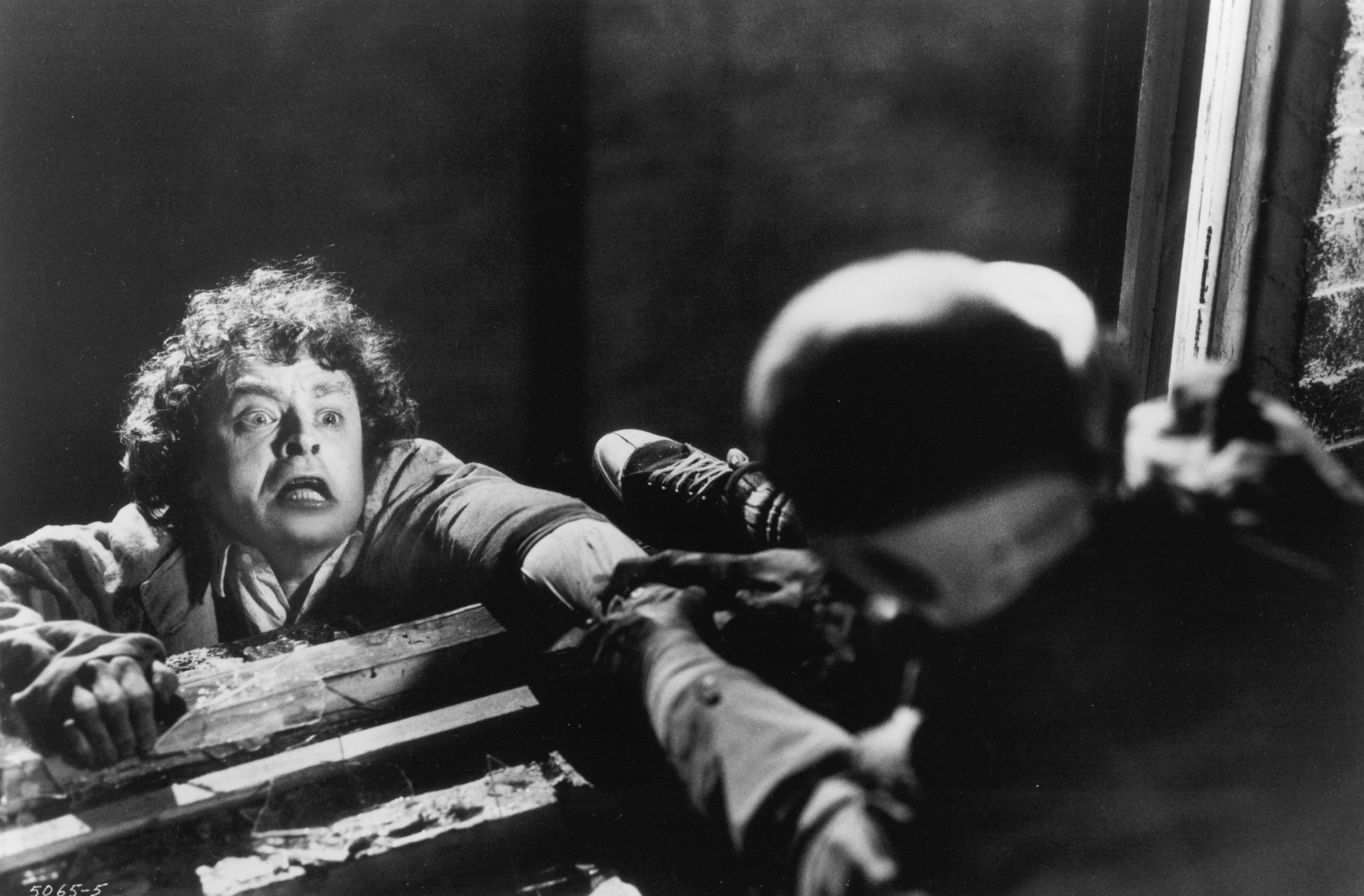 Still of Brad Dourif and John Walsh in Body Parts (1991)